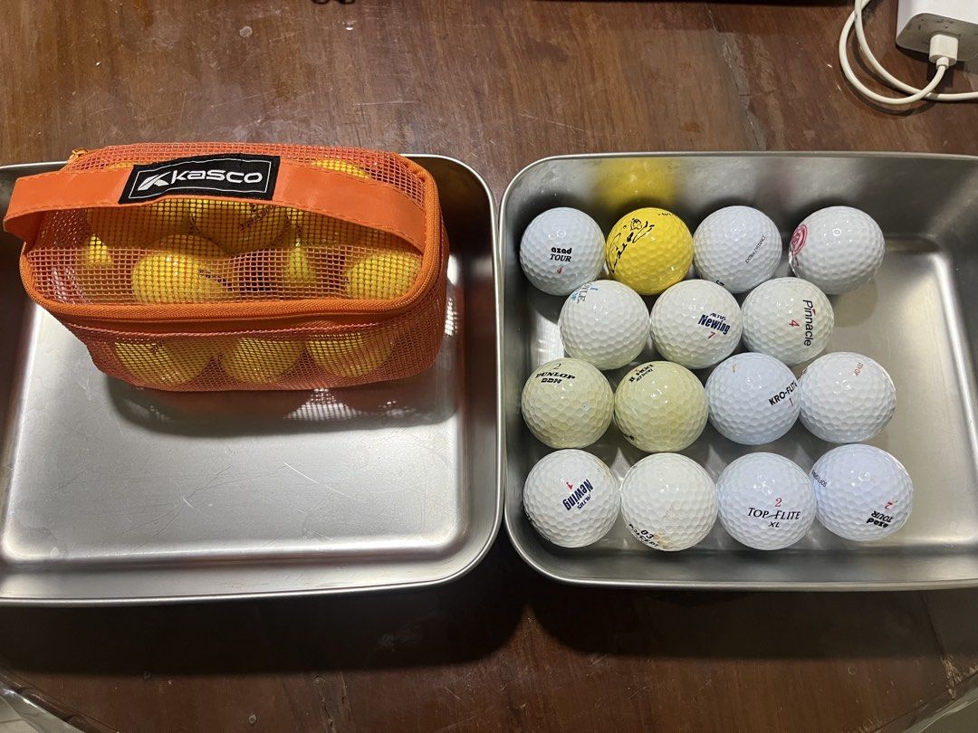 TAKE ALL! Assorted Golf Balls with Kasco Orange Mesh Storage Bag (Category: Golf) located in Manila. Submitted by jeppy393 (Listing ID 1470907051, Image 1). Description: - Brand assortment: TourStage, Srixon, Spalding, Dunlop, Newing, Pinnacle, and Top-Flite - Color mix: Combination of white and yellow balls (includes some with logos and numbers) - Storage: Comes with a convenient orange mesh Kasco zipper pouch - Condition/Use: Ideal for practice