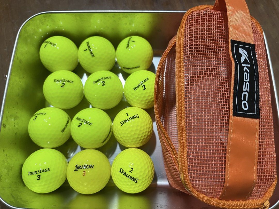 TAKE ALL! Assorted Golf Balls with Kasco Orange Mesh Storage Bag (Category: Golf) located in Manila. Submitted by jeppy393 (Listing ID 1470907051, Image 2). Description: - Brand assortment: TourStage, Srixon, Spalding, Dunlop, Newing, Pinnacle, and Top-Flite - Color mix: Combination of white and yellow balls (includes some with logos and numbers) - Storage: Comes with a convenient orange mesh Kasco zipper pouch - Condition/Use: Ideal for practice