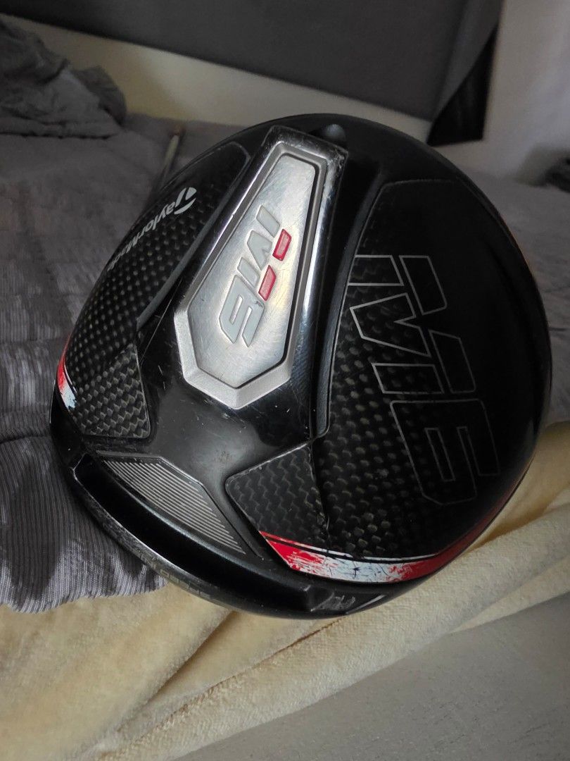 TaylorMade M6 Golf Driver (Category: Golf) located in Manila. Submitted by wisecloud.ffa337 (Listing ID 1470930216, Image 1). Description: - Model: TaylorMade M6 Driver Clubhead - Finish: Black and carbon fiber with red and silver accents - Design: Aerodynamic shape with a standard large sweet spot - Condition: Usual scuffs and scratches on the sole and crown from normal course play - Compatibility: Ready to mount on your favorite shaft.
