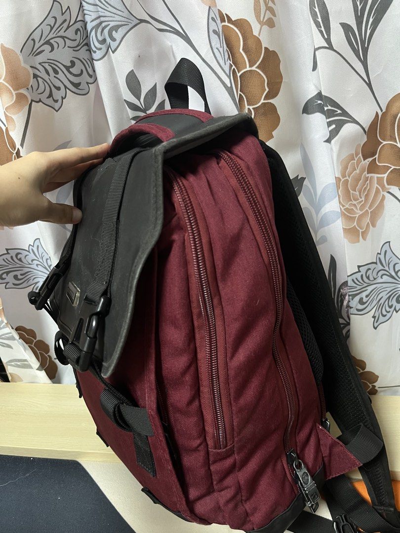 Technopack Maroon and Black Backpack (Category: Backpacks) located in General Trias. Submitted by walterwhiteyo (Listing ID 1470776161, Image 2). Description: - Color: Maroon with black flap cover - Brand: Technopack metal badge - Design: Dual buckle straps and smooth zippers - Comfort: Padded shoulder straps and mesh back panel - Interior: Multiple compartments with branded lining .