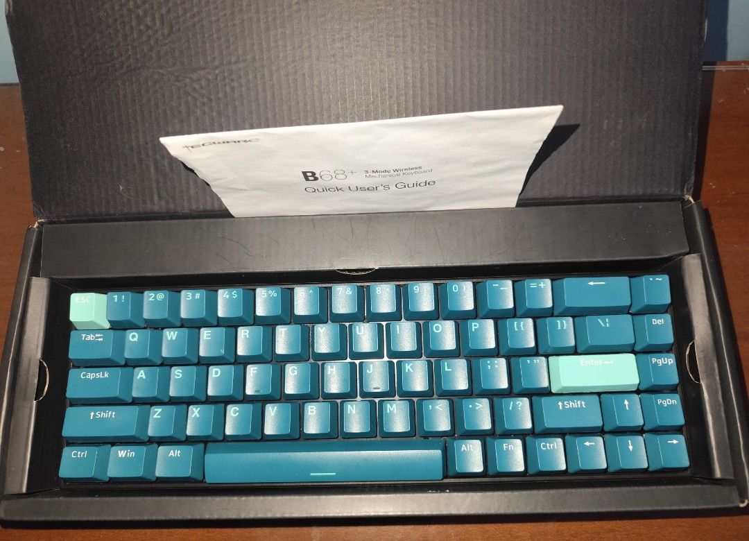 Tecware B68+ 3-Mode Wireless Mechanical Keyboard (Category: Computer Keyboard) located in Manila. Submitted by karu0 (Listing ID 1470841370, Image 3). Description: Tecware B68+ 3-Mode Wireless Mechanical Keyboard Teal & Blue custom doubleshot PBT keycaps - Layout: 65% KB - Connectivity: Bluetooth 5.0, 2.4G wireless, and removable Type-C cable - Switches: Can support 3 and 5 pin; Kailh box white clicky switches -Has Software to fine tune - Has a K