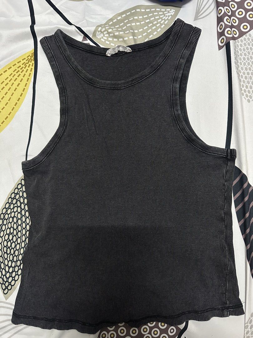 Terranova Ribbed Black Tank Top Size M (Category: Sleeveless) located in Manila. Submitted by francellin (Listing ID 1470765166, Image 1). Description: - Brand: Terranova - Style: Ribbed tank top with scoop neck and racerback - Color: Washed black - Size: Medium (tag indicates) - Material: Soft, stretchy cotton knit - Condition: Great basic piece for layering or wearing solo.