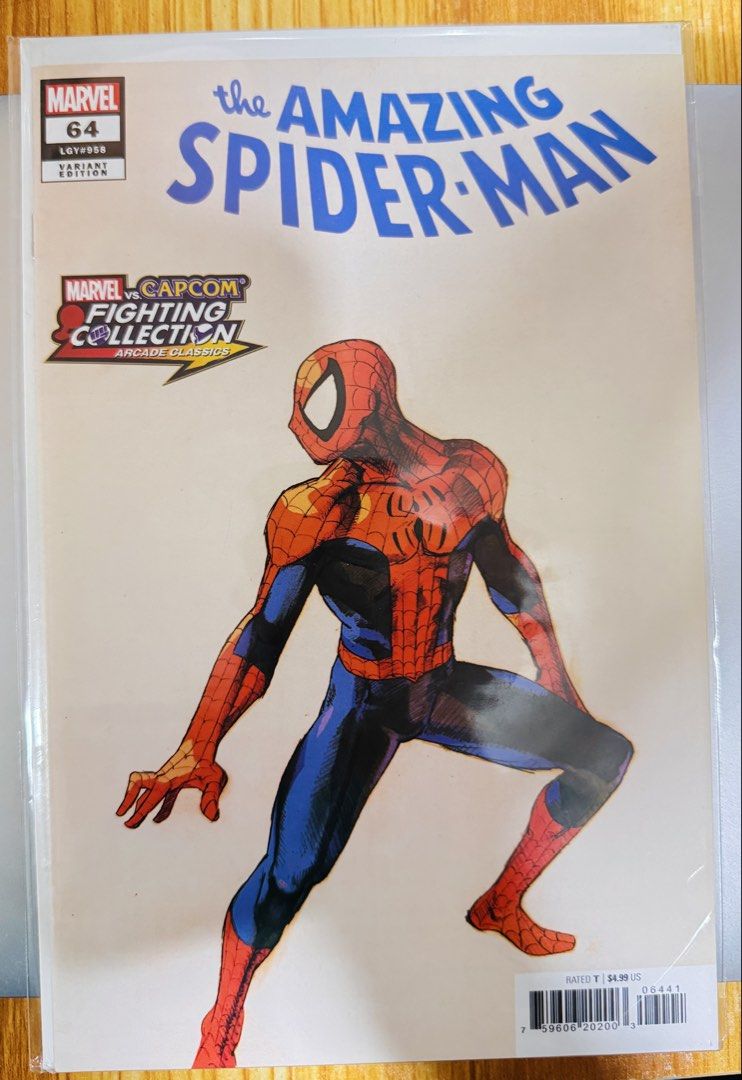 The Amazing Spider-Man #64 Marvel vs Capcom Fighting Collection (Category: Comics & Manga) located in Malabon City. Submitted by wilbert.te (Listing ID 1470899804, Image 1). Description: - Title: The Amazing Spider-Man #64 Variant Edition - Cover: Marvel vs Capcom arcade classics crossover art - Publisher: Marvel Comics - Condition: Clean copy, stored in a protective plastic bag sleeve - Ideal for collectors and fans.