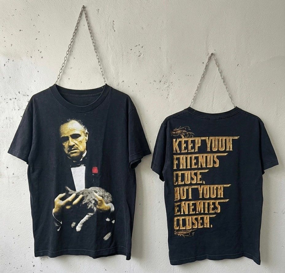 The Godfather Don Corleone Tee (Category: Tshirts & Polo Shirts ) located in Manila. Submitted by got_loots (Listing ID 1470754438, Image 1). Description: WTS❗️❗️❗️ The Godfather Don Corleone Tee In Good Condition Dimes: 18x25.5 ₱800 Only.