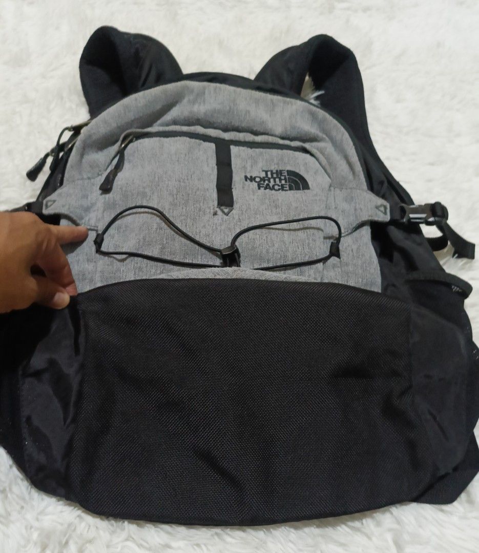 The North Face Borealis Backpack Grey Black (Category: Backpacks) located in Quezon City. Submitted by lootsniwoah_12 (Listing ID 1470885884, Image 2). Description: - Authentic The North Face Borealis backpack in grey and black - Multiple zipped compartments and mesh side pockets for easy organization - Exterior bungee cord system for extra gear - Padded shoulder straps and sturdy top grab handle for all-day comfort - Durable everyday carry ideal