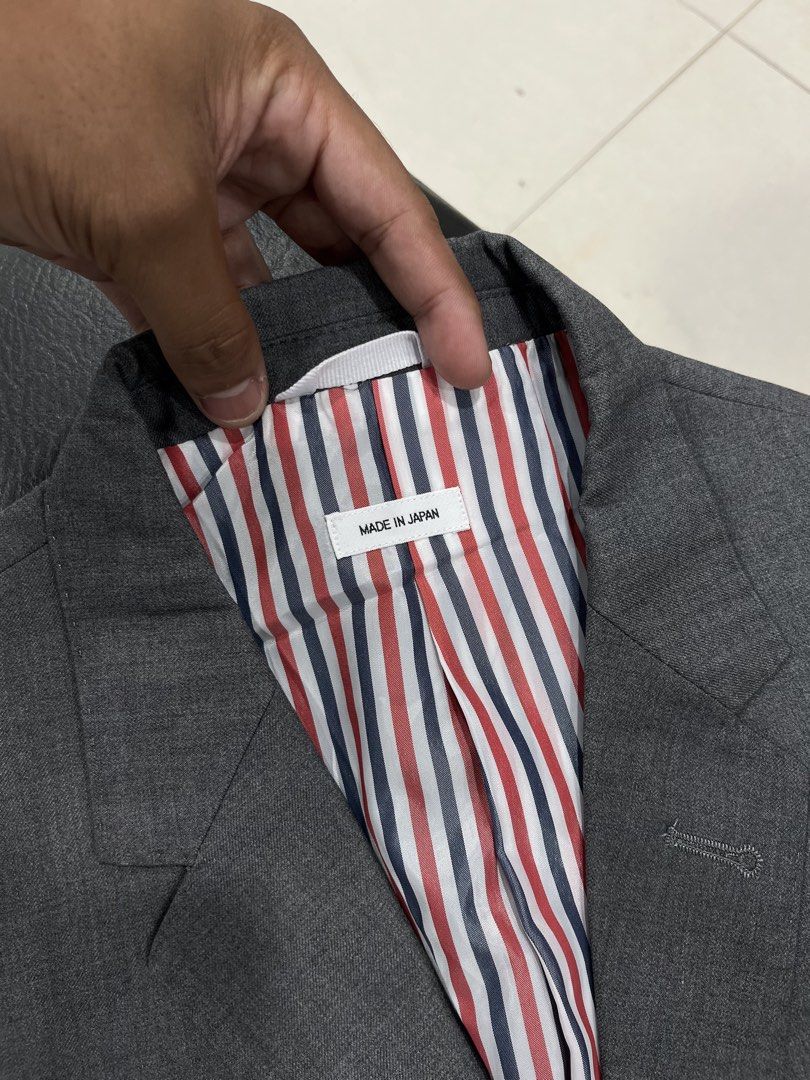 Thom Browne 4 Bar Blazer (Category: Coats, Jackets and Outerwear) located in Manila. Submitted by pure.ayoyyysss (Listing ID 1470794667, Image 3). Description: Thom Browne 4 Bar Blazer Sz1 Width: 19 Width : 27 Sleeve 24 Execellent No issue 5k free sf .