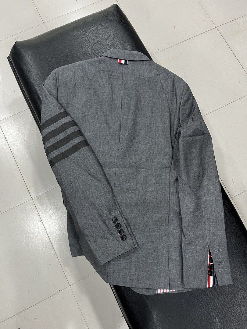 Thom Browne 4 Bar Blazer (Category: Coats, Jackets and Outerwear) located in Manila. Submitted by pure.ayoyyysss (Listing ID 1470794667, Image 2). Description: Thom Browne 4 Bar Blazer Sz1 Width: 19 Width : 27 Sleeve 24 Execellent No issue 5k free sf .