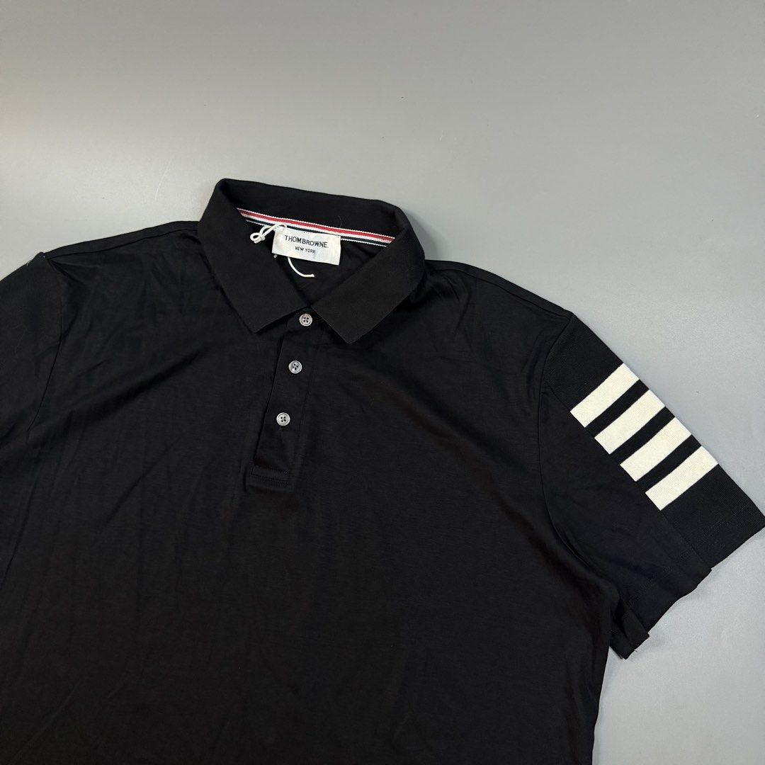 Thom Browne - Poloshirt 4-Bar Sleeve (Category: Tshirts & Polo Shirts ) located in Paranaque City. Submitted by millennial_goodz (Listing ID 1470908096, Image 3). Description: WTS Thom Browne - Poloshirt 4-Bar Sleeve Size Large fitting Dimensions: 22.5" / 29" Drifit Material Ready to use DM.