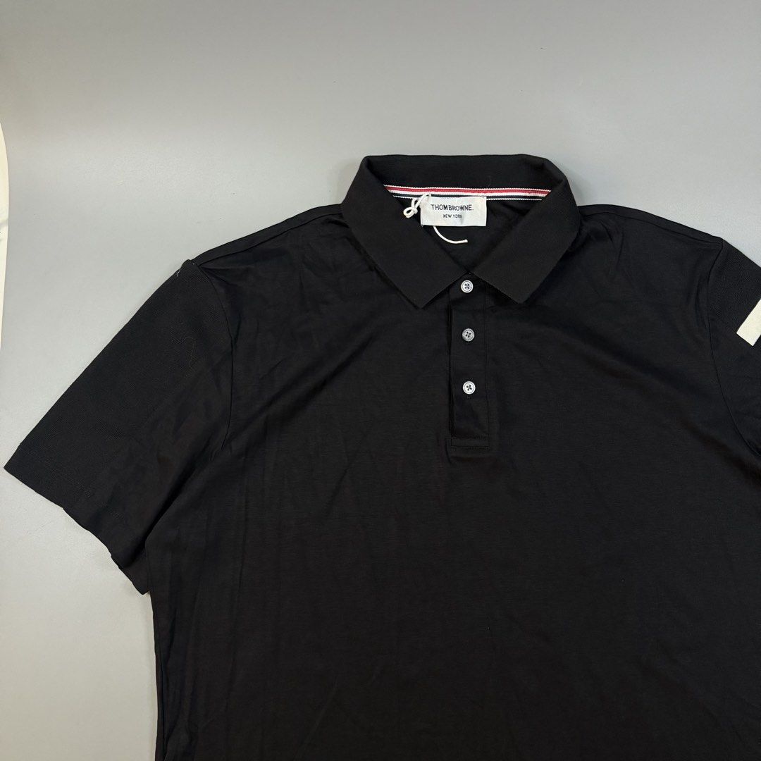 Thom Browne - Poloshirt 4-Bar Sleeve (Category: Tshirts & Polo Shirts ) located in Paranaque City. Submitted by millennial_goodz (Listing ID 1470908096, Image 2). Description: WTS Thom Browne - Poloshirt 4-Bar Sleeve Size Large fitting Dimensions: 22.5" / 29" Drifit Material Ready to use DM.