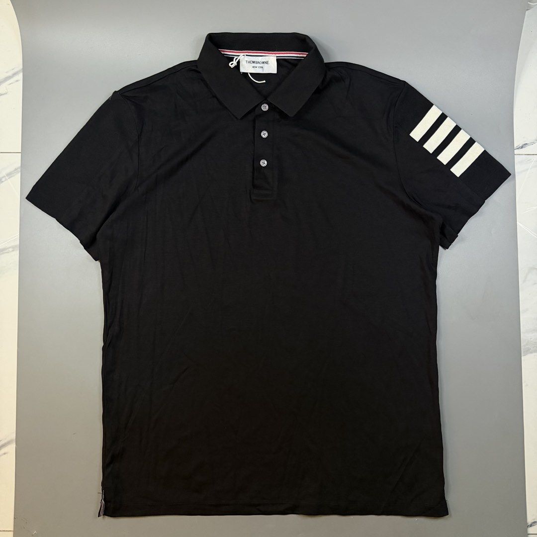 Thom Browne - Poloshirt 4-Bar Sleeve (Category: Tshirts & Polo Shirts ) located in Paranaque City. Submitted by millennial_goodz (Listing ID 1470908096, Image 1). Description: WTS Thom Browne - Poloshirt 4-Bar Sleeve Size Large fitting Dimensions: 22.5" / 29" Drifit Material Ready to use DM.