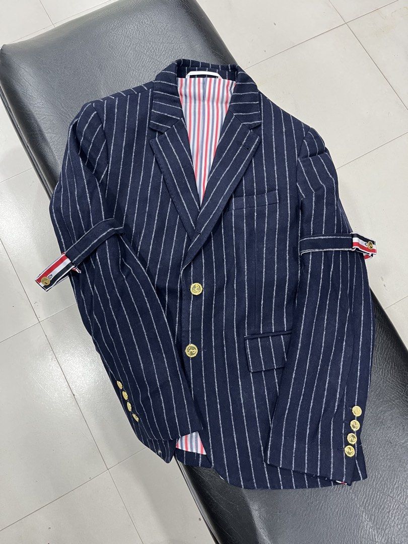 Thom Browne Flannel Chalk Stripe Armband Blazer Jacket (Category: Coats, Jackets and Outerwear) located in Manila. Submitted by pure.ayoyyysss (Listing ID 1470869768, Image 1). Description: Thom Browne Flannel Chalk Stripe Armband Blazer Jacket Sz1 Width : 18.5 Length : 27 Sleeve : 24 Execellent No issue 10k Shipped.