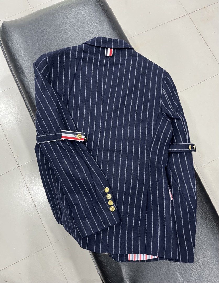 Thom Browne Flannel Chalk Stripe Armband Blazer Jacket (Category: Coats, Jackets and Outerwear) located in Manila. Submitted by pure.ayoyyysss (Listing ID 1470869768, Image 2). Description: Thom Browne Flannel Chalk Stripe Armband Blazer Jacket Sz1 Width : 18.5 Length : 27 Sleeve : 24 Execellent No issue 10k Shipped.