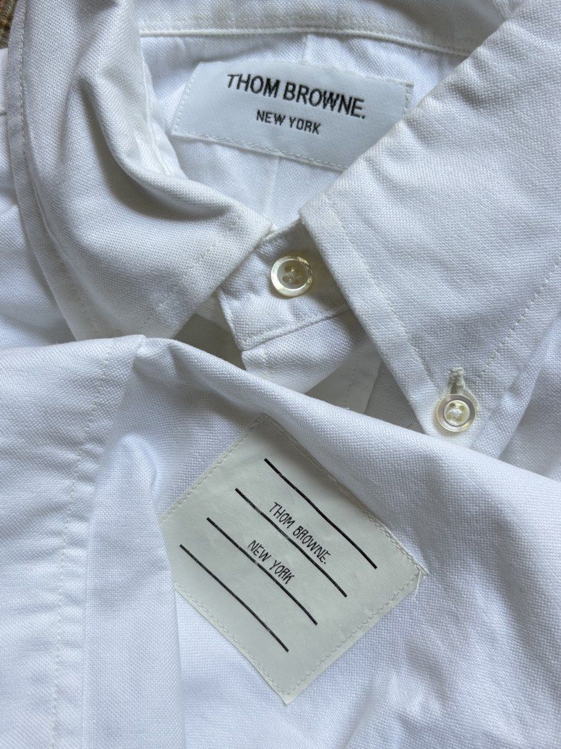 THOM BROWNE Oxford 3 Bar Stripe Long sleeve (Category: Formal Shirts) located in Dagupan City. Submitted by anyklasiko (Listing ID 1470829080, Image 3). Description: THOM BROWNE Oxford 3 Bar Stripe Long sleeve Size: 0 Width: 19’ Length: 29.5’ Shoulder: 16.5’ Sleeve: 24’ Price: 13999 .