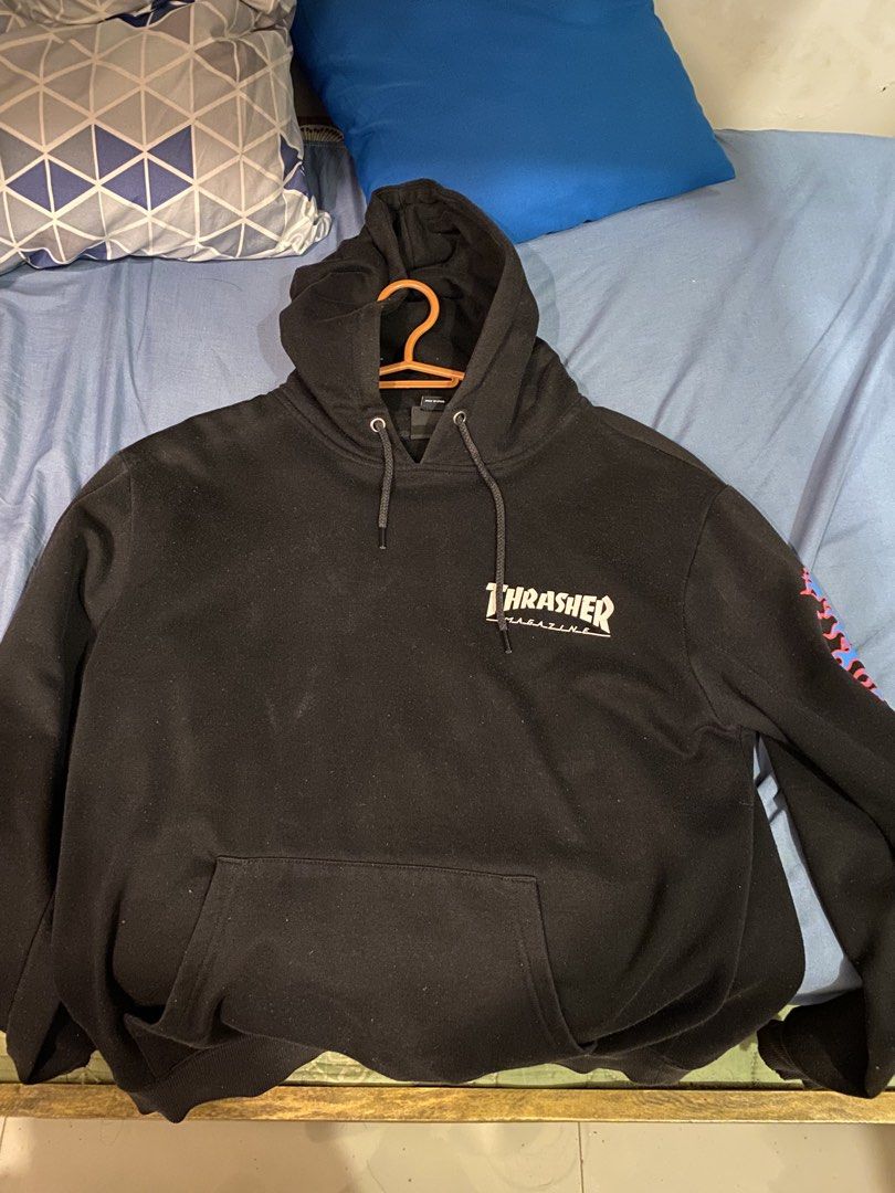 Thrasher Flame Logo Black Hoodie Medium (Category: Hoodies) located in Bauan. Submitted by oneiasan (Listing ID 1470856553, Image 1). Description: - Brand/Model: Thrasher Magazine Hoodie - Color: Black - Size: Medium - Design: Iconic blue/red flame logo on sleeve, small chest print - Features: Soft fleece interior, drawstring hood, front kangaroo pocket - Condition: Worn a few times, excellent shape, clean and ready to wear - Note: DM for exact m