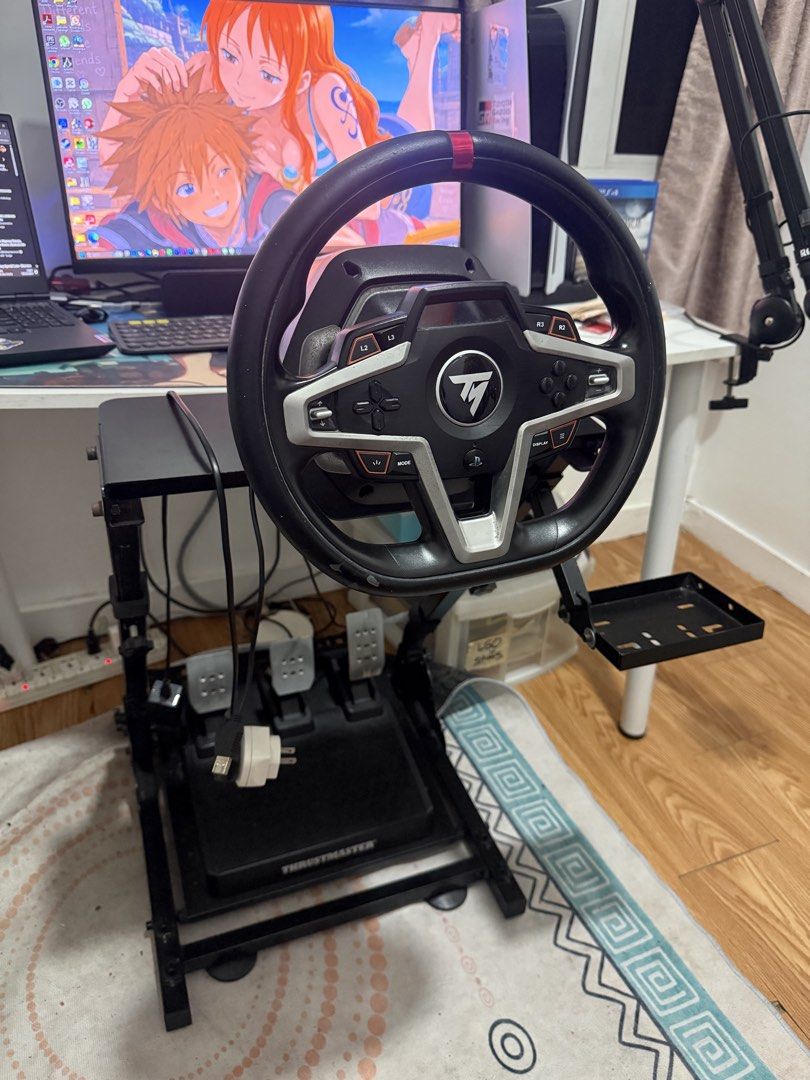 Thrustmaster T248 Racing Wheel and Pedals with Stand (Category: Controllers) located in Quezon City. Submitted by brightstartech1029 (Listing ID 1470890153, Image 1). Description: - Thrustmaster T248 racing wheel and pedal bundle - Includes heavy-duty metal stand and gear shifter plate attachment - Three responsive metal pedals included - Force feedback wheel with built-in display panel and multiple button configs - Fully wired with power supply 