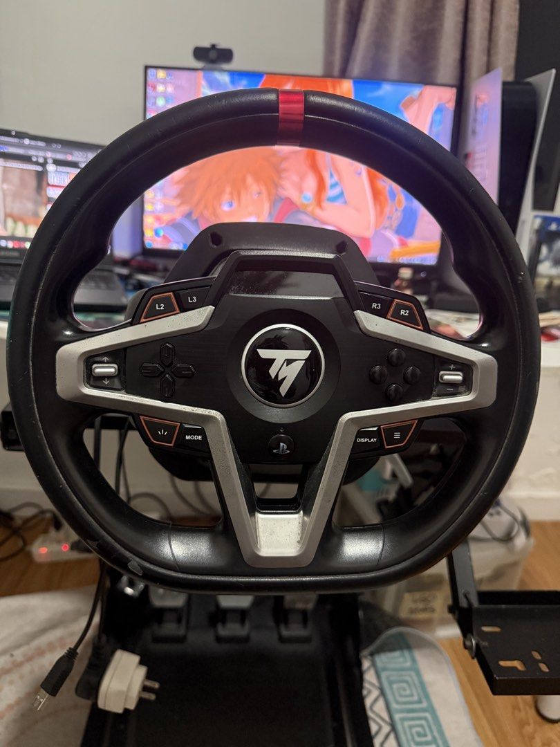 Thrustmaster T248 Racing Wheel and Pedals with Stand (Category: Controllers) located in Quezon City. Submitted by brightstartech1029 (Listing ID 1470890153, Image 2). Description: - Thrustmaster T248 racing wheel and pedal bundle - Includes heavy-duty metal stand and gear shifter plate attachment - Three responsive metal pedals included - Force feedback wheel with built-in display panel and multiple button configs - Fully wired with power supply 