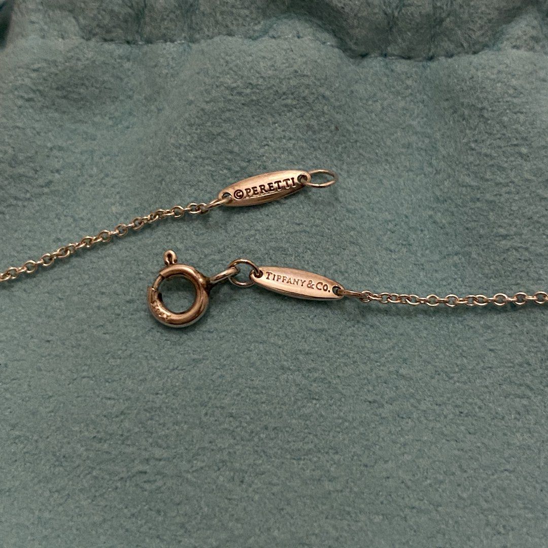 Tiffany & Co cross necklace + prehnite ring (Category: Necklaces) located in Mandaluyong City. Submitted by tinytrinket (Listing ID 1470914713, Image 3). Description: - Tiffany & Co. x Elsa Peretti sterling silver cross pendant 12mm long and 9.5mm wide on a 16” chain (no more box just pouch) - handmade sterling silver prehnite gemstone ring.