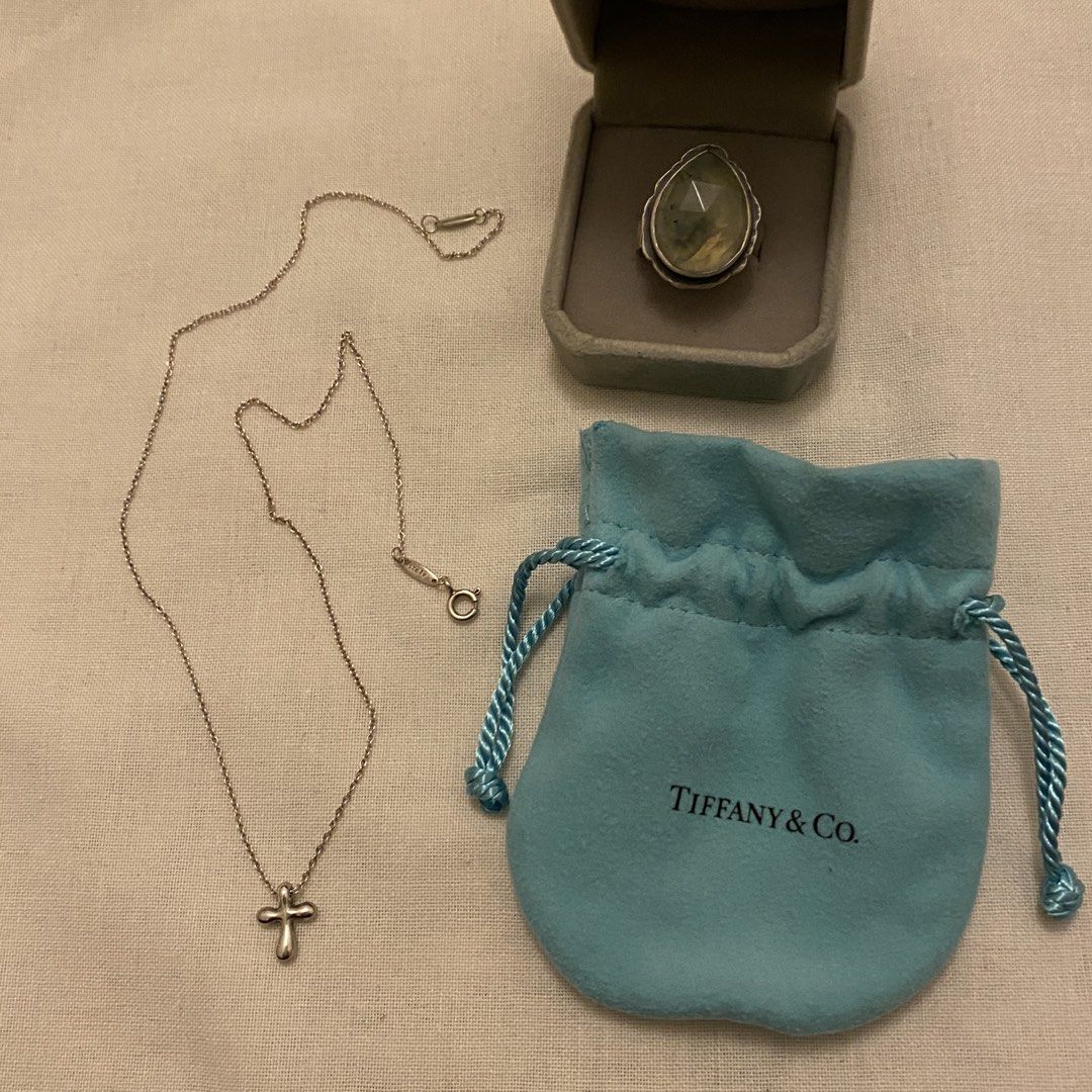 Tiffany & Co cross necklace + prehnite ring (Category: Necklaces) located in Mandaluyong City. Submitted by tinytrinket (Listing ID 1470914713, Image 1). Description: - Tiffany & Co. x Elsa Peretti sterling silver cross pendant 12mm long and 9.5mm wide on a 16” chain (no more box just pouch) - handmade sterling silver prehnite gemstone ring.