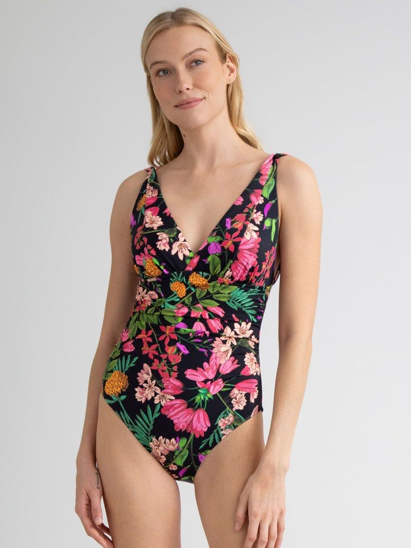 Time and tru (Category: Bikinis & Swimsuits) located in Malabon City. Submitted by lheithriftshop (Listing ID 1470806965, Image 1). Description: image shows a Time and Tru Women’s and Women’s Plus Plunge V-Neck One-Piece Swimsuit in a black and pink tropical floral print..