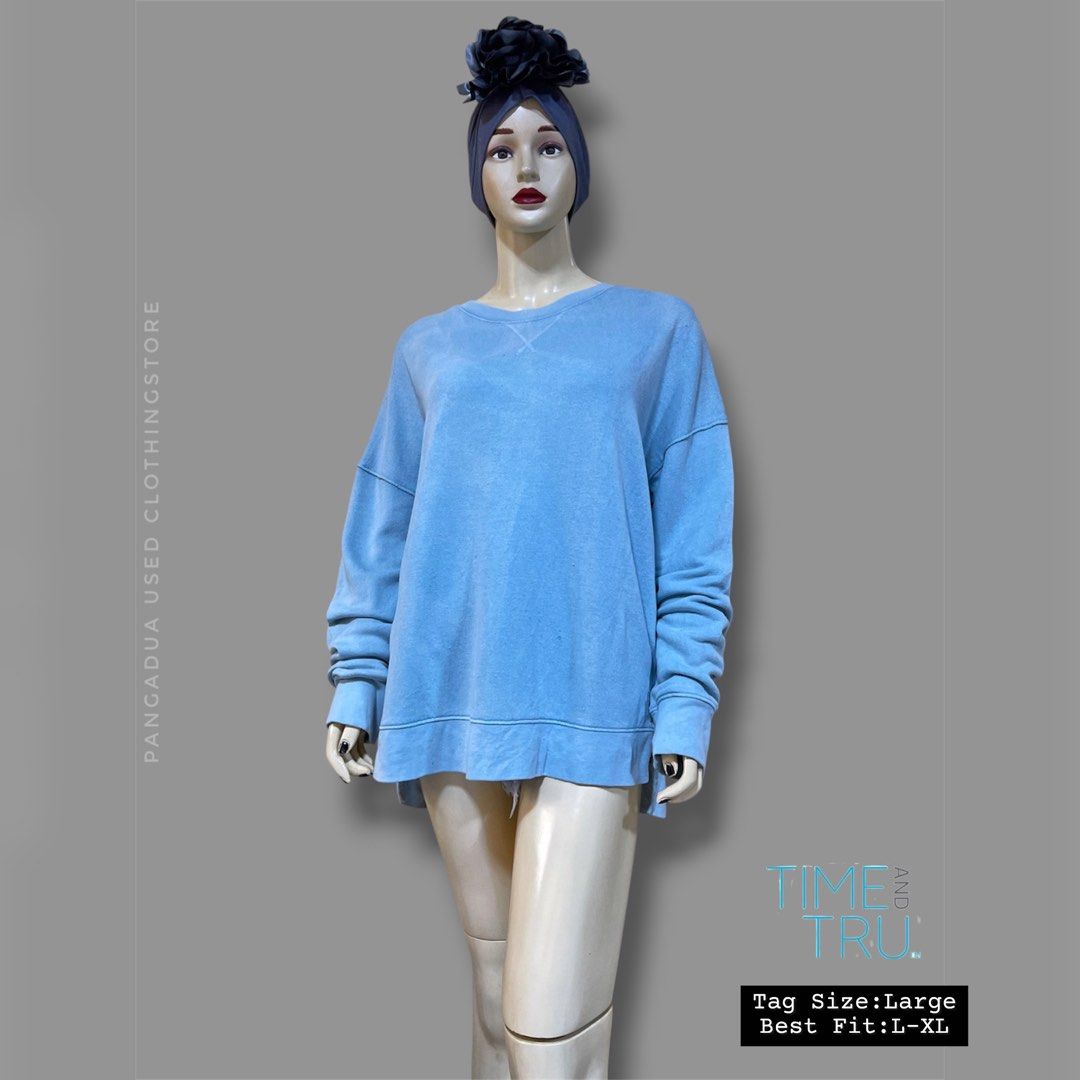 Time and Tru Blue Oversized Sweatshirt Size L (Category: Coats, Jackets and Outerwear) located in Naga. Submitted by 2ndusedclothingstore (Listing ID 1470855563, Image 1). Description: - Brand: Time and Tru - Color: Light blue - Size: Tagged L, fits like L to XL - Fit: Relaxed fit with dropped shoulders - Details: Crew neck, ribbed cuffs, soft French terry interior - Condition: Great for casual, everyday wear.