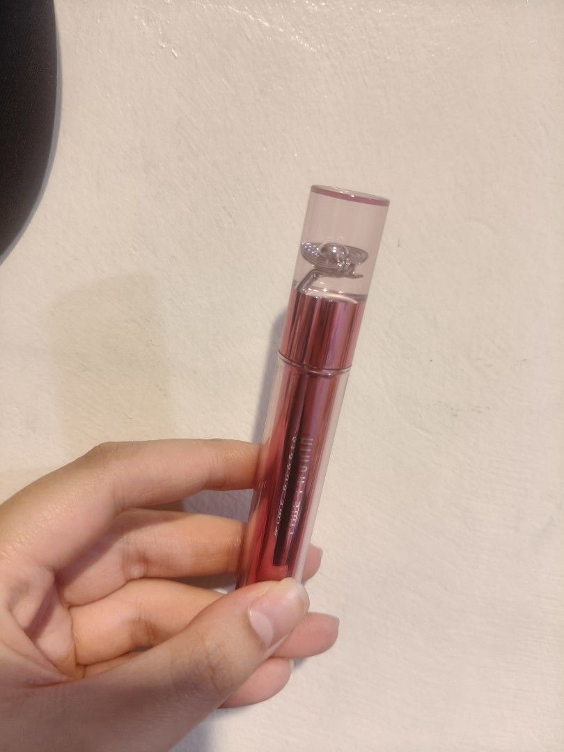 Time Phoria Altera Blurring Lip Tint 006 Wisp (Category: Makeup) located in Davao. Submitted by yvanaavik_sulit (Listing ID 1470891670, Image 2). Description: - Brand: Time Phoria Altera Blurring Lip Tint - Shade: 006 Wisp (Versatile, great daily pink) - Condition: Swatched once / barely used (99% product left) - Size: 4g / 0.14 oz - Packaging: Metallic pink with clear cap and decorative spiral - Applicator: Hygienic doe-foot applicator.