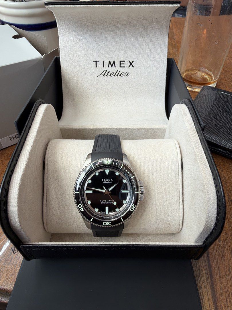Timex Atelier Marine M1A (Category: Men's Watches) located in Taguig. Submitted by watchgeekmnl (Listing ID 1470790259, Image 1). Description: - Model: Timex Atelier Marine M1A Automatic Dive Watch - Condition: Brand New - Movement: Swiss made automatic - Water Resistance: 200 meters - Features: Black dial, rotating bezel, luminous markers and hands - Strap: Comfortable black rubber strap - Inclusions: Original presentation box included.