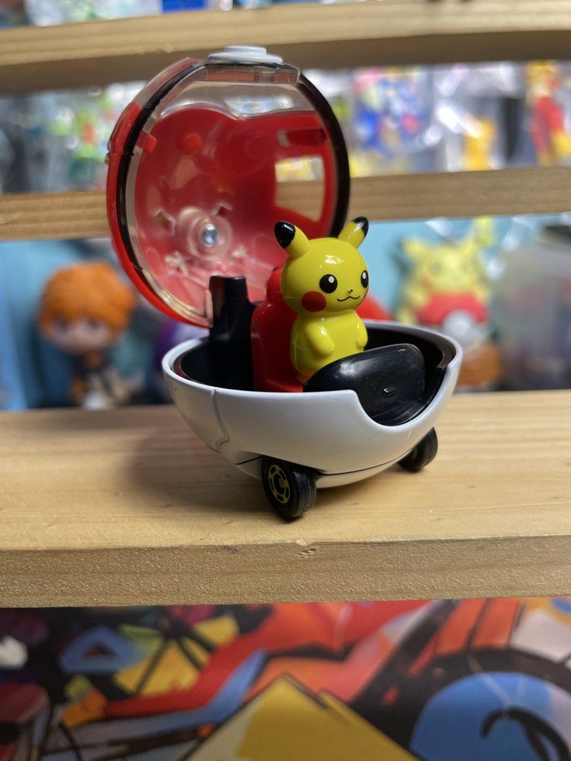 Tomica Pokémon Poké Ball Pikachu Car (Category: Vehicle & Diecast Models) located in Valenzuela. Submitted by bjtoycollections (Listing ID 1470879177, Image 3). Description: - Official Tomica x Pokémon collaboration featuring a Pokéball design - Adorable Pikachu figure seated inside the opening clear canopy roof - Rolls smoothly on three wheels for play or display - Authentic bottom stamps showing Tomica, Tomy, and Nintendo markings (Made in Viet