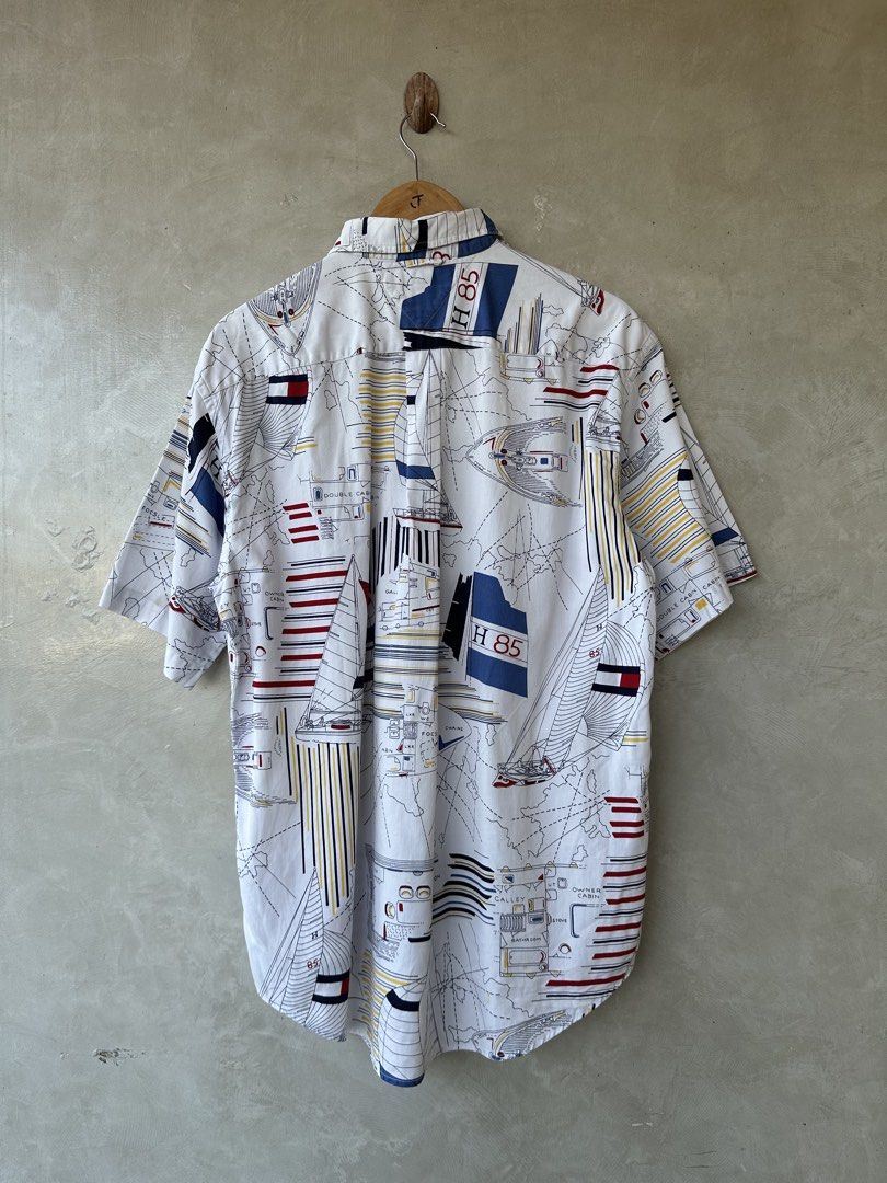 TOMMY HILFIGER - AOP Sailing Button Up Polo (Category: Tshirts & Polo Shirts ) located in Cavite. Submitted by second_story_ph (Listing ID 1470827695, Image 2). Description: TOMMY HILFIGER - AOP Sailing Button Up Polo Size: Medium Dimension: 23.5” Width / 29.5” Length Condition: Excellent to New.