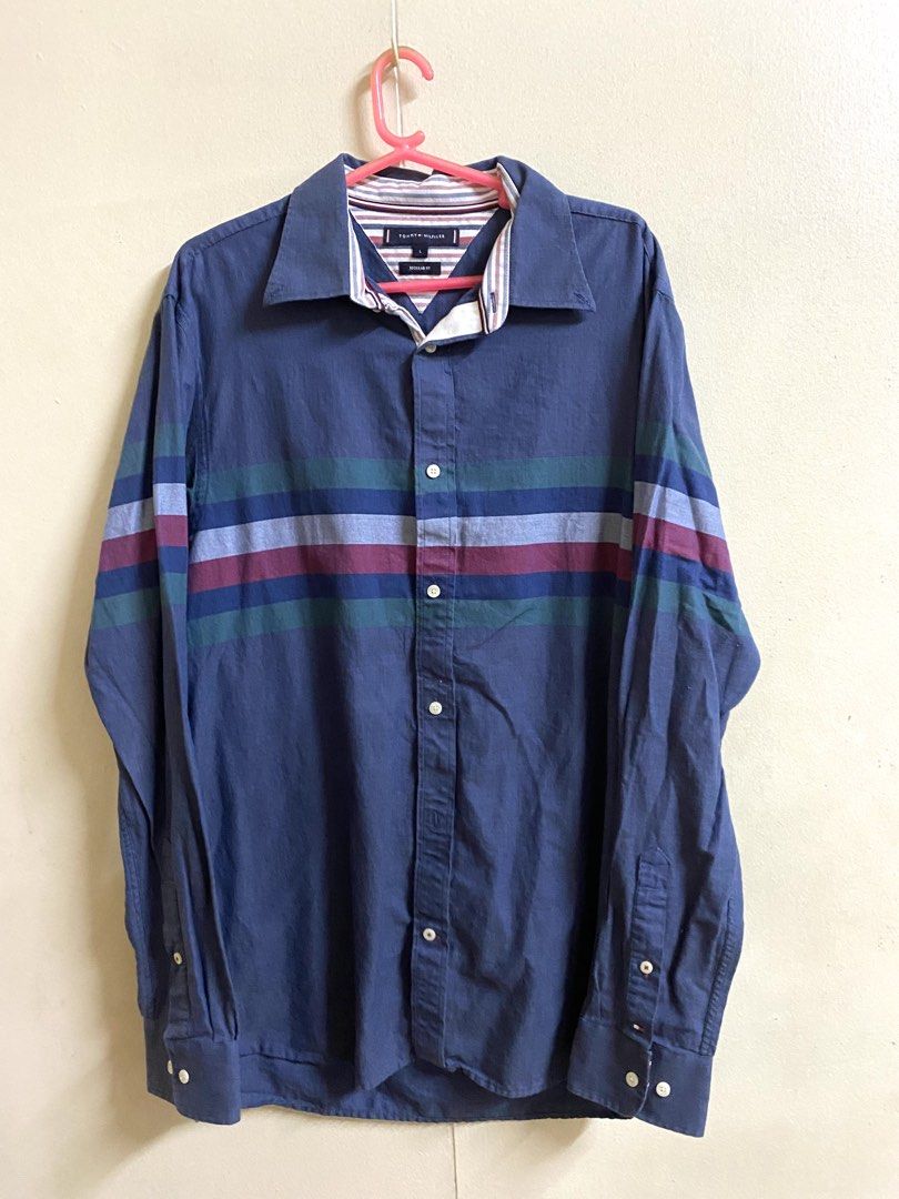 Tommy Hilfiger Blue Button Shirt (Category: Tshirts & Polo Shirts ) located in Makati City. Submitted by pepperstoremerch (Listing ID 1470884263, Image 1). Description: Tommy Hilfiger Blue Button Shirt Size Large 100% Cotton Preloved, good condition Please see pictures D0124 P261028R50C21.
