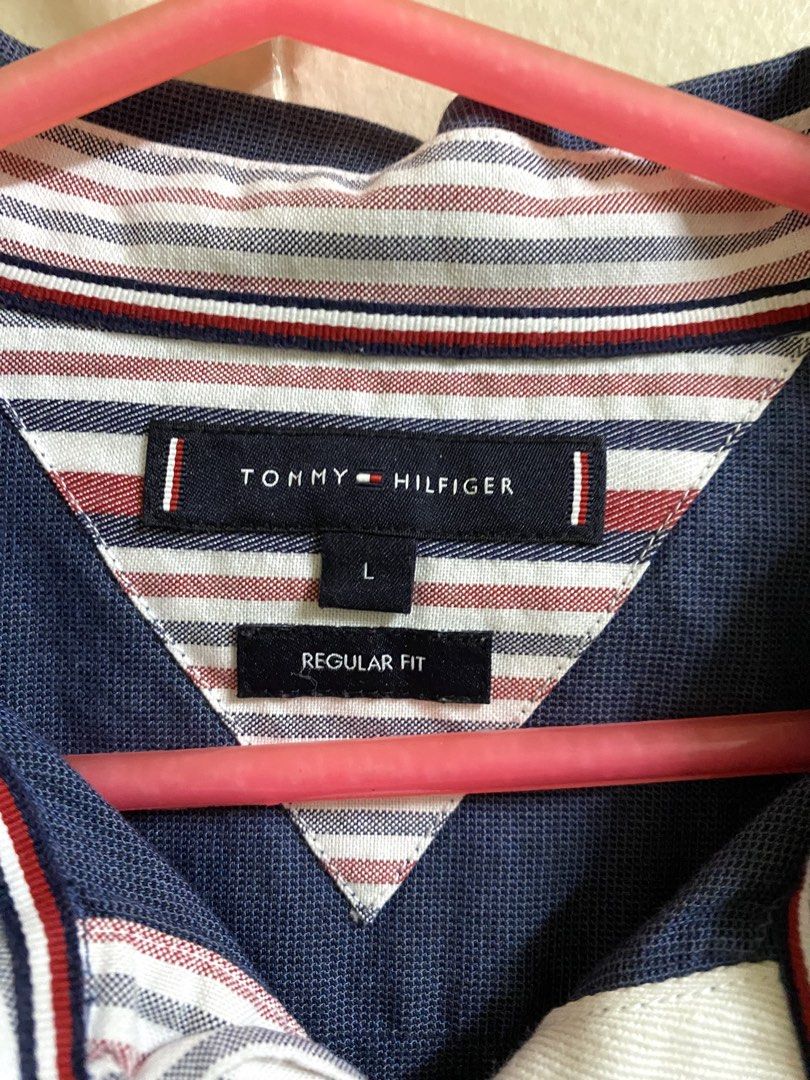 Tommy Hilfiger Blue Button Shirt (Category: Tshirts & Polo Shirts ) located in Makati City. Submitted by pepperstoremerch (Listing ID 1470884263, Image 3). Description: Tommy Hilfiger Blue Button Shirt Size Large 100% Cotton Preloved, good condition Please see pictures D0124 P261028R50C21.