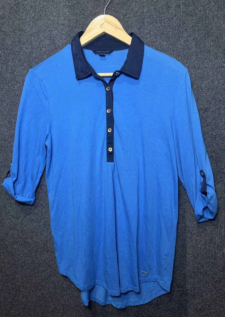 Tommy Hilfiger Blue Polo Shirt (Category: Blouses) located in Baguio. Submitted by thriftcoded_2600 (Listing ID 1470863722, Image 2). Description: - Brand: Tommy Hilfiger - Size: M - Excellent Condition Needs wash - Authentic - 18x26.