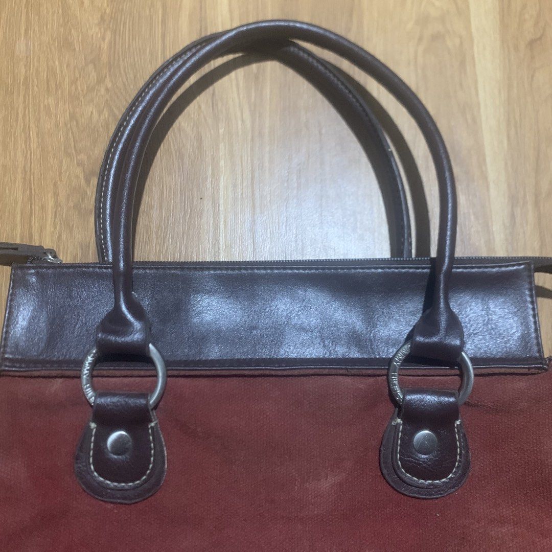 Tommy Hilfiger Burgundy Suede (Category: Shoulder Bags) located in Calauan. Submitted by randomthrift.womens (Listing ID 1470888071, Image 2). Description: Tommy Hilfiger burgundy suede leather tote bag with brown leather trim .