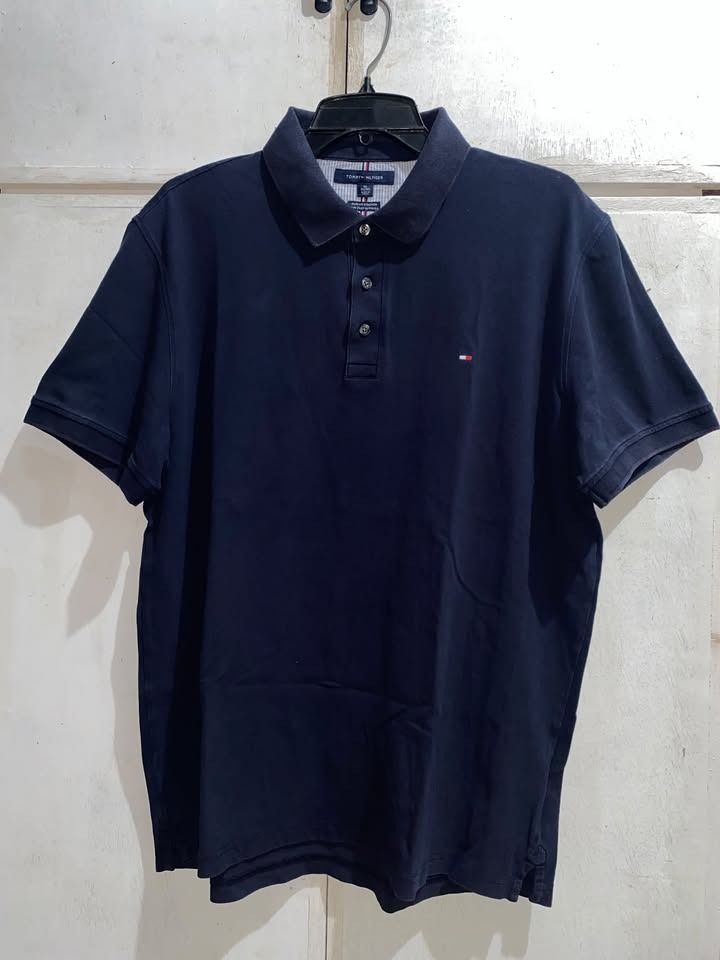 Tommy Hilfiger Navy Blue (Category: Tshirts & Polo Shirts ) located in Caloocan City. Submitted by lthrifts993 (Listing ID 1470849591, Image 1). Description: Tommy Hilfiger Navy Blue 23x28 Color Rate: 9.5/10 Issue: None .