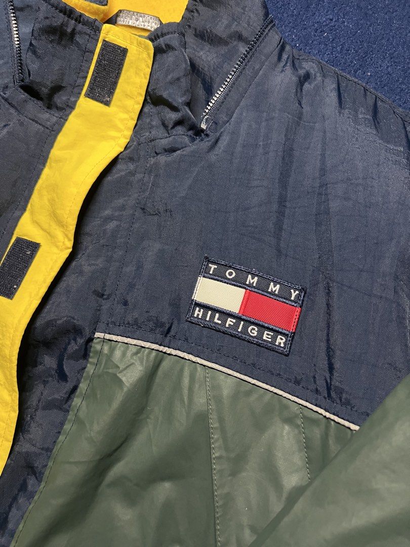Tommy Hilfiger Vintage 90s Puffer Jacket (Category: Coats, Jackets and Outerwear) located in Pasig City. Submitted by downlowtooslow (Listing ID 1470877813, Image 3). Description: Vintage Tommy Hilfiger Colorblock PufferJacket 22 width 26 length - Classic Tommy Hilfiger embroidered chest logo - Full-zip design with a bold yellow front closure.