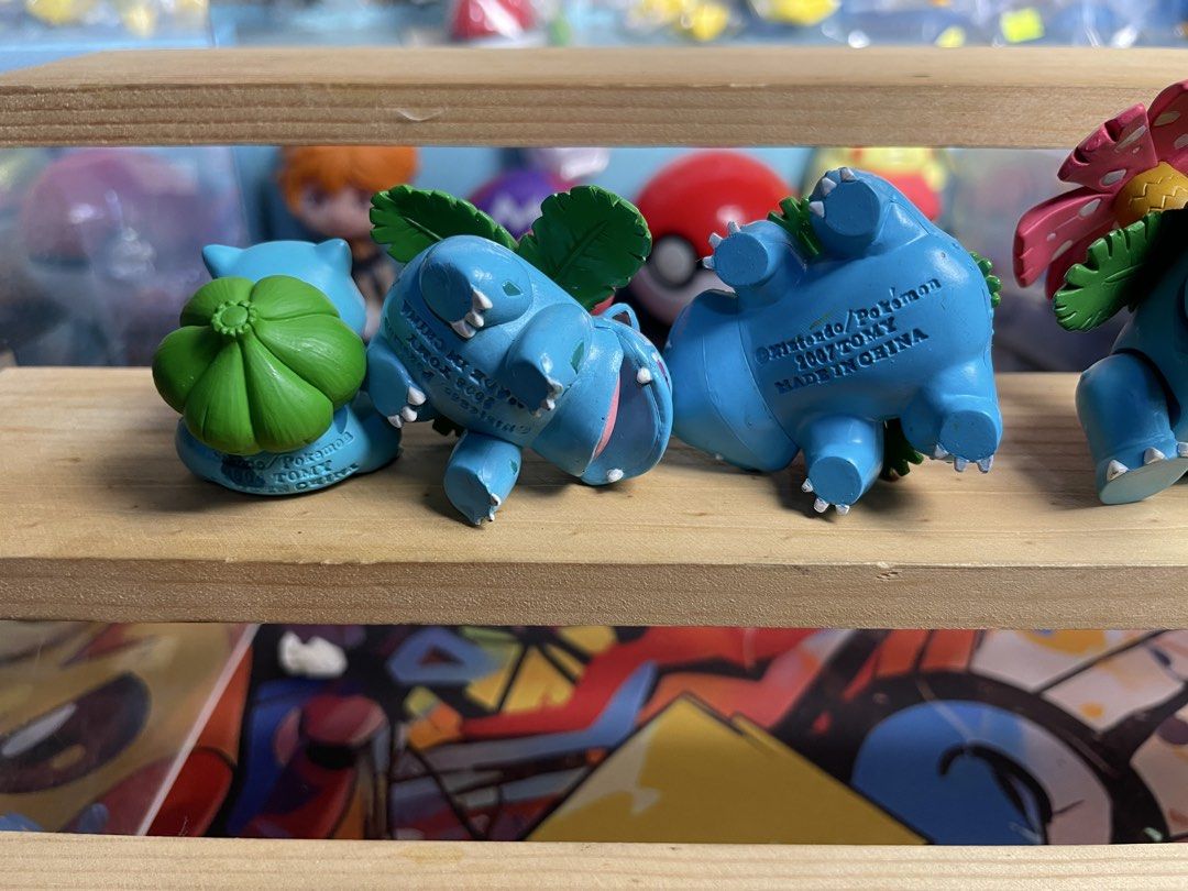 TOMY Bulbasaur evolution LineFigure set (Category: Figurines & Statues) located in Valenzuela. Submitted by bjtoycollections (Listing ID 1470876238, Image 3). Description: - Complete Bulbasaur evolution set by TOMY including Bulbasaur, Ivysaur, and Venusaur - Official Nintendo and Pokémon stamps on the bottom of each figure - Detailed paintwork featuring clean lines on claws and flowers.