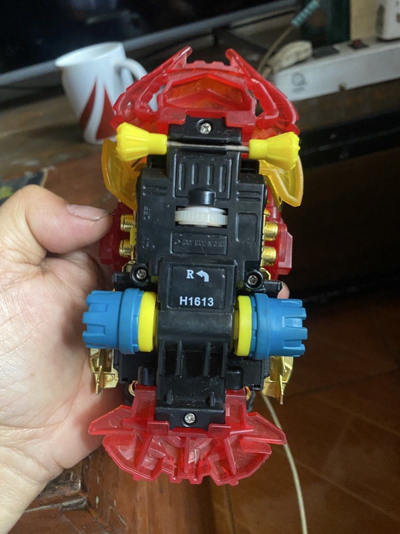 Tomy crush gear 2 pcs for 1.5k (Category: Vehicle & Diecast Models) located in Marikina City. Submitted by jtv17 (Listing ID 1470761115, Image 2). Description: Selling a set of 2 authentic Takara crush gear. Includes one metallic pink/clear translucent variant and one red/gold variant with a yellow spinning top attachment. Both are structurally intact with minor storage dust. Serial H1613 on black undercarriage. Great for collectors!.