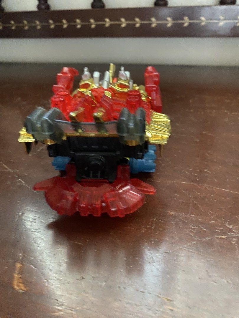 Tomy crush gear 2 pcs for 1.5k (Category: Vehicle & Diecast Models) located in Marikina City. Submitted by jtv17 (Listing ID 1470761115, Image 3). Description: Selling a set of 2 authentic Takara crush gear. Includes one metallic pink/clear translucent variant and one red/gold variant with a yellow spinning top attachment. Both are structurally intact with minor storage dust. Serial H1613 on black undercarriage. Great for collectors!.
