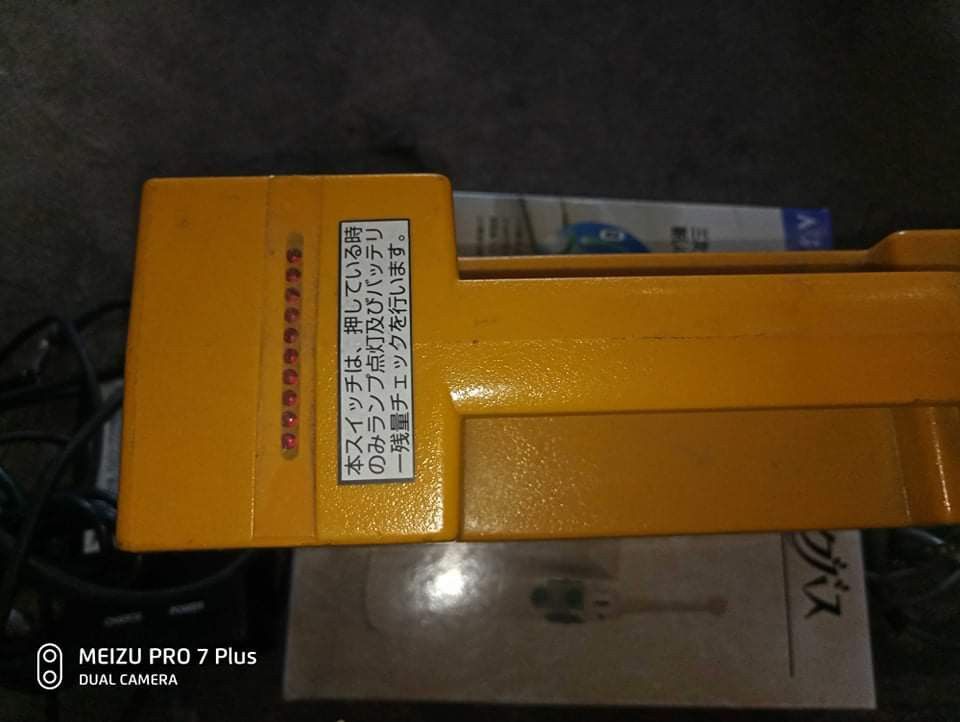Topcon Battery with Battery Charger Model BVW1225 (Category: Construction Tools & Equipment) located in Taguig. Submitted by grandfish_55ab5c (Listing ID 1470928803, Image 2). Description: - Brand/Model: Yellow Topcon rechargeable battery unit - Type: Lead-acid battery setup with a convenient built-in handle - Included: Ault Inc battery charger (Model BVW1225) and connecting cables - Charger Specs: Input 100-240V, Output 14.7V - Additional Info: 