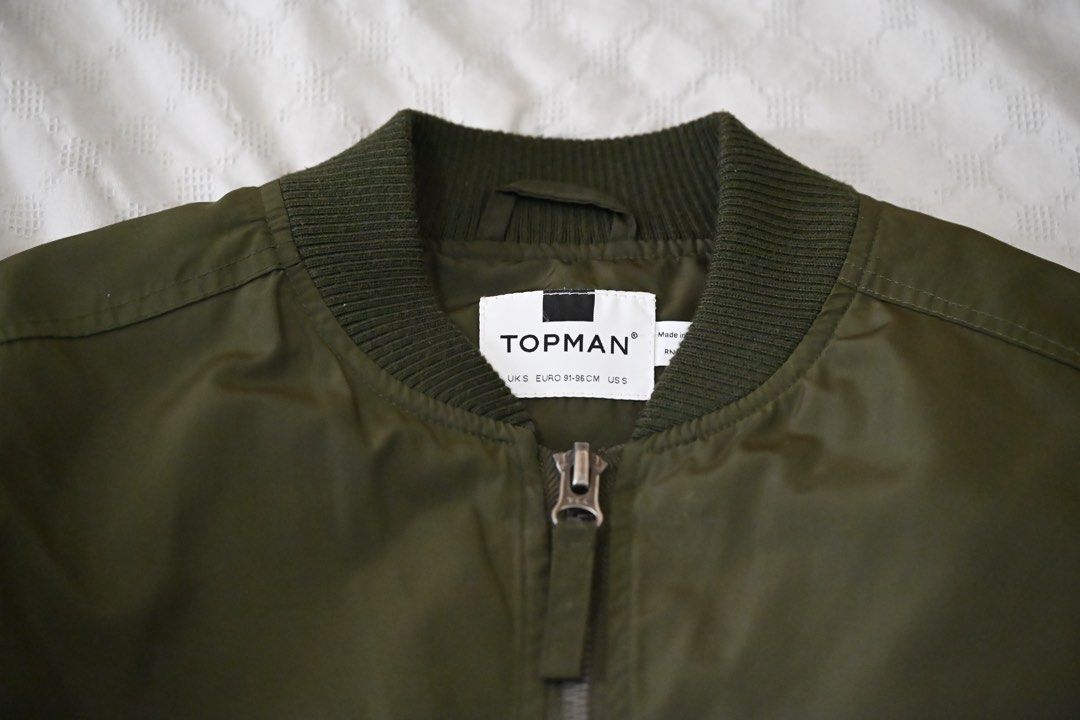 Topman Bomber Jacket (Category: Coats, Jackets and Outerwear) located in Quezon City. Submitted by karlojosev (Listing ID 1470776528, Image 2). Description: Size Shoulder 45 cm Length from shoulder 56 cm Arm length 64 cm.