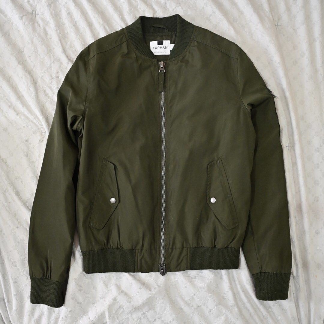 Topman Bomber Jacket (Category: Coats, Jackets and Outerwear) located in Quezon City. Submitted by karlojosev (Listing ID 1470776528, Image 1). Description: Size Shoulder 45 cm Length from shoulder 56 cm Arm length 64 cm.
