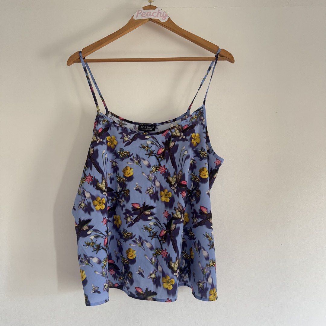 Topshop floral top (Category: Blouses) located in Manila. Submitted by apparella.ph (Listing ID 1470747224, Image 1). Description: 10/10 hard to let go super pretty Bust:42 Length:17 ☑️Everything is my Own preloved / BNWT/BNWOT ☑️ not thrifted/Ukay ☑️ malukot sa picture kasi na stock sa cabinet (tinatamad mag plantsa ✌️ ) ☑️Personal items ( usually bought in US/UK/JPN ) every year po ako nag aabroad so expect i don’t sell fake items and mejo pric