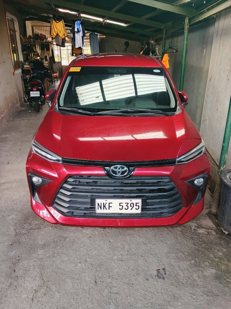 Toyota Avanza 1.5 Manual (Category: Used Cars) located in Quezon City. Submitted by markie18 (Listing ID 1470756419, Image 1). Description: 🚗 TOYOTA AVANZA 2024 🚗 ✅ Model: Toyota Avanza 2024 ✅ Fuel: Gasoline ✅ Transmission: Manual ✅ Color: Maroon ✅ Condition: All working and in good running condition 📌 RFS: Upgrading to a newer model. ✨ Ready to drive! 📩 PM me for more details, price, and viewing..