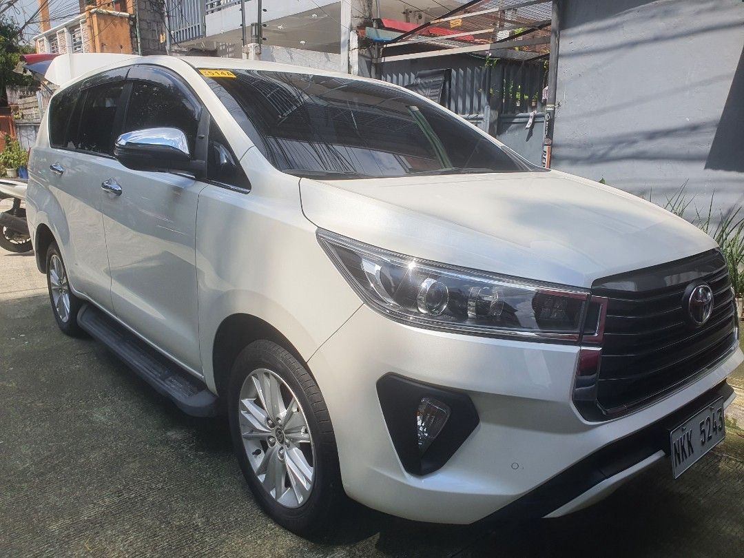 Toyota Innova (Category: Used Cars) located in Quezon City. Submitted by olxph_935890903 (Listing ID 1470764875, Image 1). Description: toyota innova v 2025 top of the line push start captain seat middle row intelligent door open all power window orig paint no repair ist owner spare key 3m tint daylight running light 17inches mags and tires 18k odo loc qc..west ave.