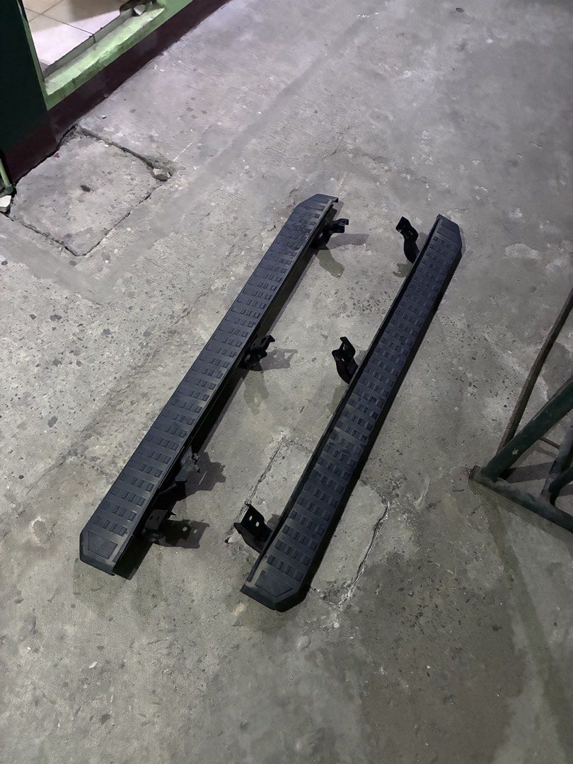 Toyota Prado Original Stepboard (Category: Body Parts and Accessories) located in Quezon City. Submitted by lopezbenj313596 (Listing ID 1470743935, Image 1). Description: Pair of original stepboards removed from a Toyota Prado after upgrading to a new set. Both stepboards feature a black finish, textured anti-slip stepping surfaces, and mounting brackets. * Vehicle: Toyota Land Cruiser Prado * Item: Side stepboards / running boards * Quantity: 2 