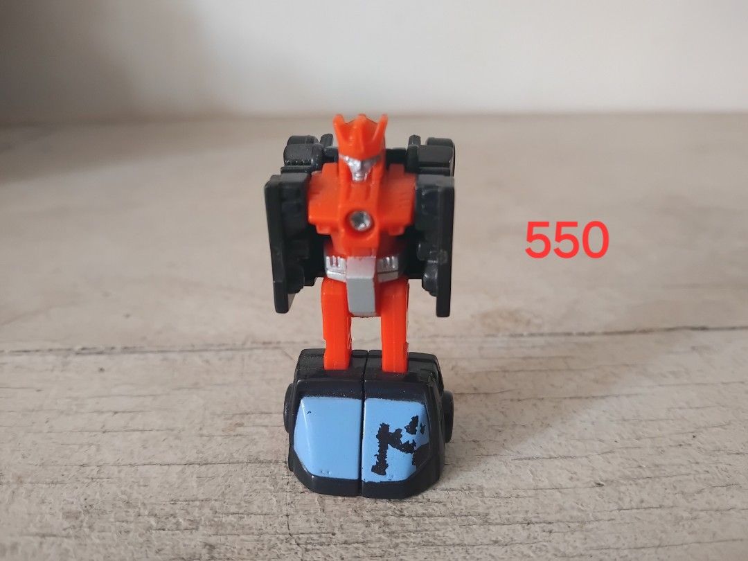 Transformers Figures and Parts Lot (Category: Action & Battle Toys) located in San Fernando. Submitted by imlikeabird (Listing ID 1470749093, Image 3). Description: - Assorted Transformers figures and weapon parts - Features grey, orange, and purple colorways - Includes robot modes, vehicle mode jets, and plastic attachments - Various transformation stages represented - Ideal for collectors needing replacement bits or extra bots - Trusted Carouse