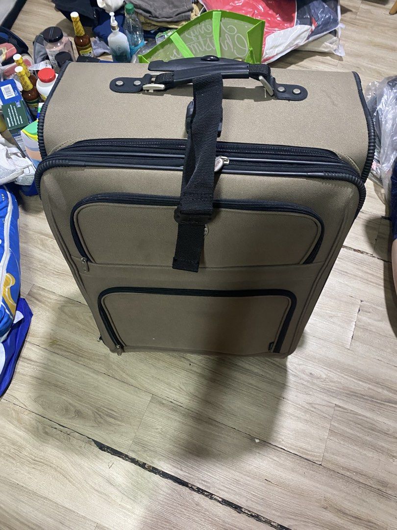 2pcs. Travelpro Luggage Suitcase (Category: Luggage) located in Makati City. Submitted by newdolphin.ef022f (Listing ID 1470765063, Image 1). Description: - Travelpro wheeled luggage in stylish tan/brown color - Includes a smaller matching bag nested inside for convenient packing - Durable fabric construction with protective strips along the back - Multiple exterior zipped pockets and heavy-duty zippers throughout - Solid top handle and a strap t