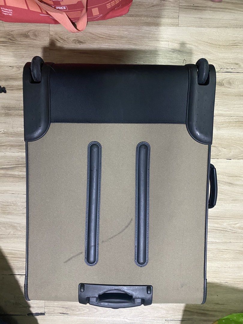 2pcs. Travelpro Luggage Suitcase (Category: Luggage) located in Makati City. Submitted by newdolphin.ef022f (Listing ID 1470765063, Image 2). Description: - Travelpro wheeled luggage in stylish tan/brown color - Includes a smaller matching bag nested inside for convenient packing - Durable fabric construction with protective strips along the back - Multiple exterior zipped pockets and heavy-duty zippers throughout - Solid top handle and a strap t