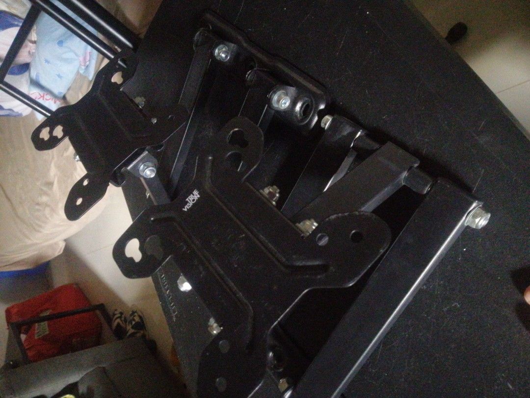 True Vision Adjustable TV Wall Mount Bracket (Category: TV Parts & Accessories) located in Manila. Submitted by vastwind_52eb49 (Listing ID 1470785284, Image 2). Description: True Vision articulating wall mount bracket for televisions and monitors. Sturdy metal arms with multiple adjustment points for swivel and tilt movement. Mounting plates included for easy wall and display installation. Black finish throughout..