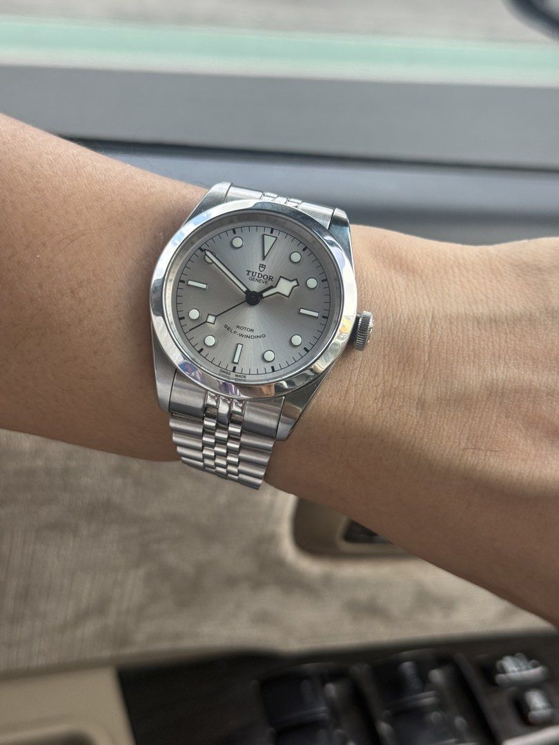 Tudor Black Bay 41 Heritage “Smiley” Silver Dial (Category: Luxury Watches) located in Manila. Submitted by spndr2 (Listing ID 1470809854, Image 2). Description: Tudor Black Bay 41 Heritage “Smiley” (Silver dial) Reference 79540 Year 2023 9/10 condition Case size: 41mm Lug width: 22mm Comes with: Original box Card Tag Extra link Booklet Original Oyster-style band a three-link bracelet. Plus aftermarket jubilee bracelet. Open for authentication at
