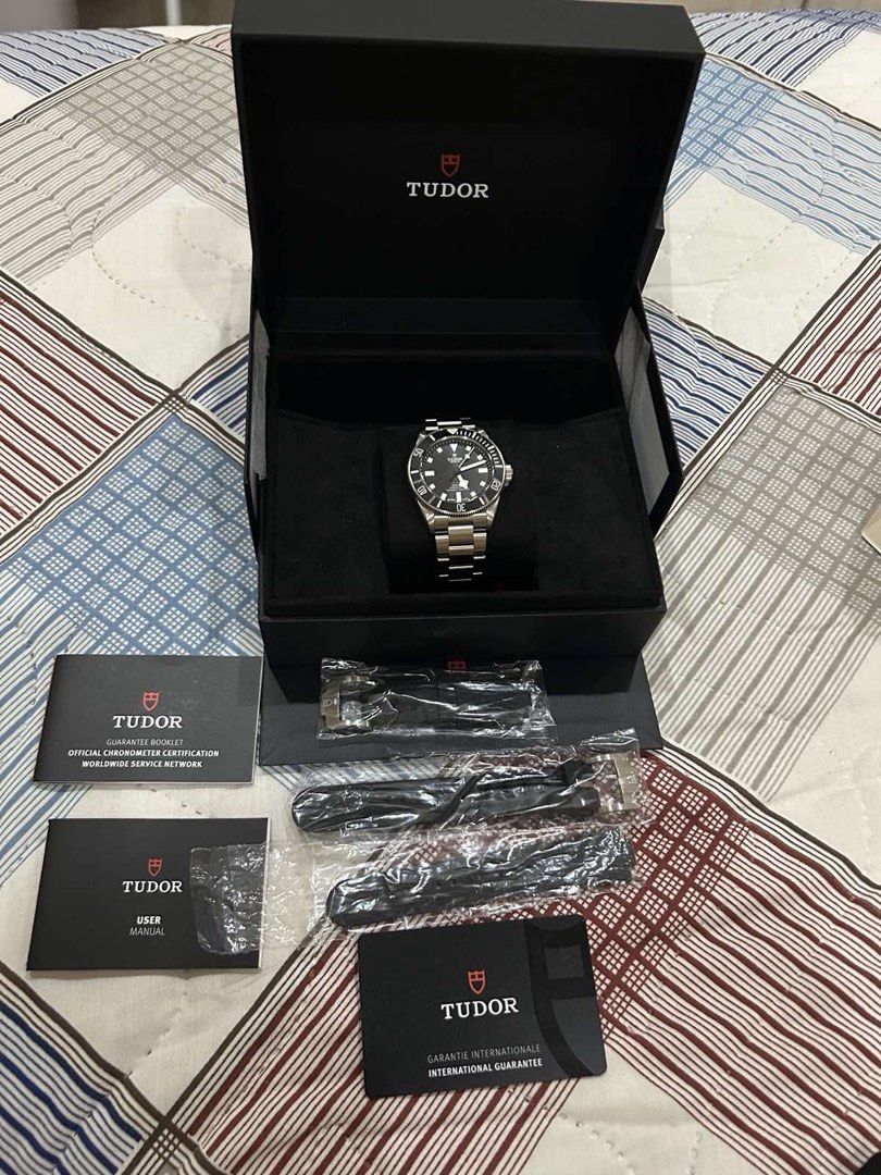 Tudor Pelagos 39 M25407N-0001 (Category: Luxury Watches) located in Manila. Submitted by aaronalejandro16 (Listing ID 1470905927, Image 2). Description: Tudor Pelagos 39 watch, model M25407N-0001. Black dial, titanium bracelet. Manufacture Calibre MT5400. Includes original presentation box, warranty card dated July 17, 2023, guarantee booklet, user manual, extra rubber straps in sealed plastic, and spare bracelet links. Unworn piece with full fac